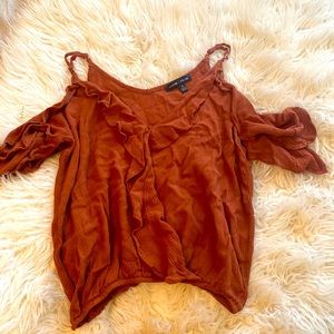 Rust colored, off the shoulder top